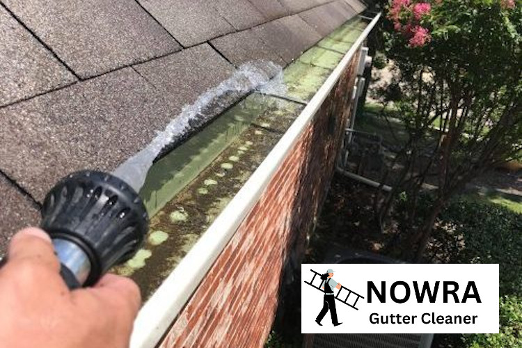 
Broughton Vale Gutter Cleaner`s Expertise: Rinsing with a Garden Hose