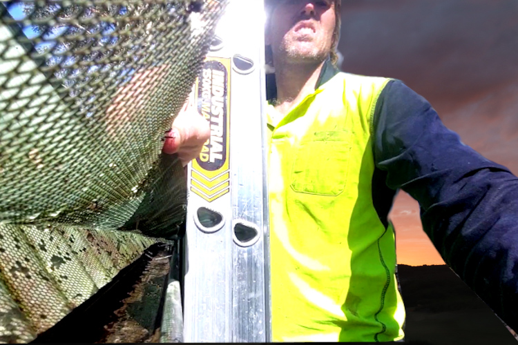 
Local nowra Gutter Cleaner Demonstrates Gutter Guard-Protected Cleaned Gutter